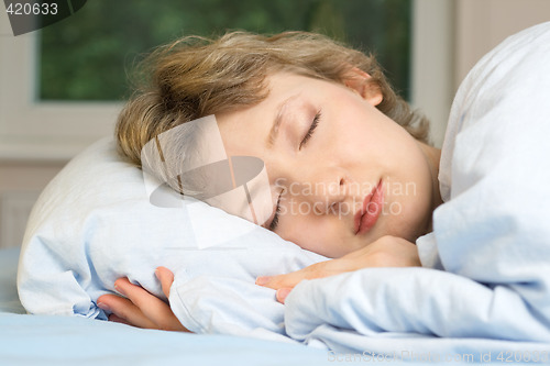 Image of young woman sleeping