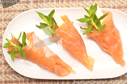 Image of appetizers with red fish