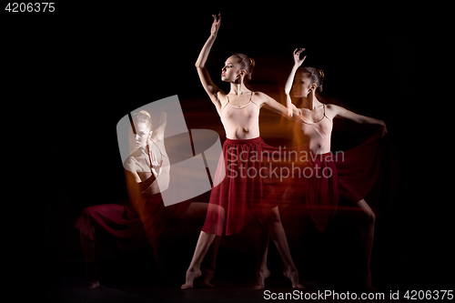 Image of The sensual and emotional dance of beautiful ballerina