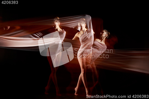 Image of The sensual and emotional dance of beautiful ballerina