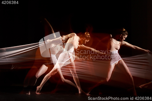 Image of The sensual and emotional dance of beautiful ballerina