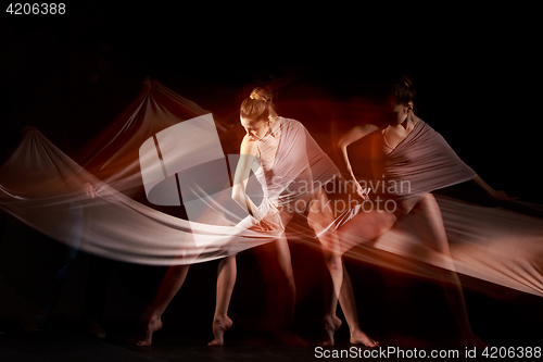 Image of The sensual and emotional dance of beautiful ballerina