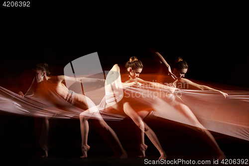 Image of The sensual and emotional dance of beautiful ballerina