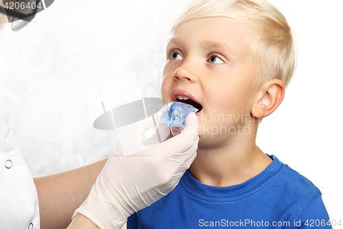 Image of First braces, orthodontist child to the doctor