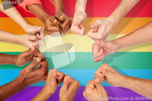 Image of hands of international people showing thumbs up