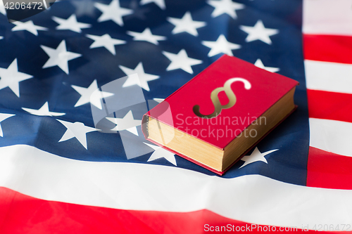 Image of close up of american flag and lawbook