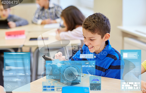 Image of school kids with tablet pc in classroom