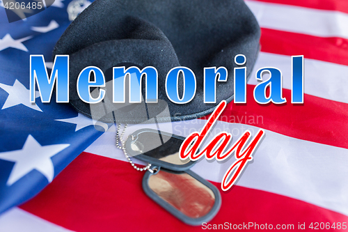 Image of memorial day over american flag, hat and dog tag