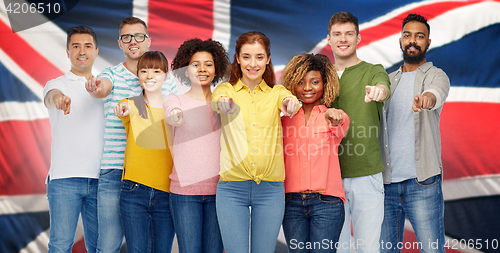 Image of international group of people pointing on you
