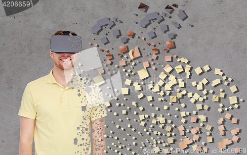 Image of happy man in virtual reality headset or 3d glasses