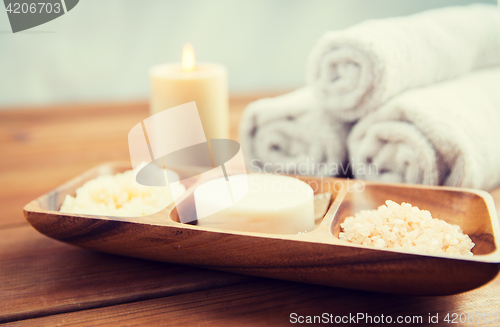 Image of close up of soap, himalayan salt and scrub in bowl