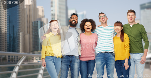 Image of international group of happy people in dubai