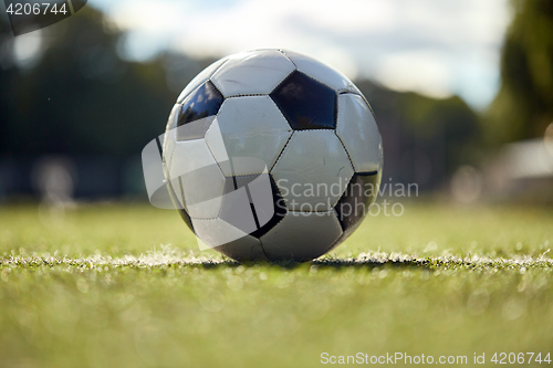 Image of soccer ball on football field