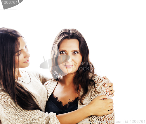 Image of cute pretty teen daughter with mature mother hugging, fashion st