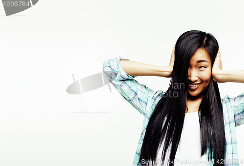 Image of young pretty asian woman posing cheerful emotional isolated on white background, lifestyle people concept