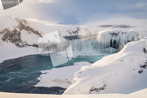 Image of Godafoss waterfall in Iceland during winter