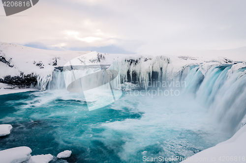 Image of Godafoss waterfall in Iceland during winter