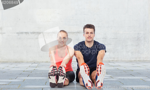 Image of happy sportive man and woman