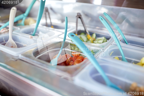 Image of containers with food at restaurant kitchen