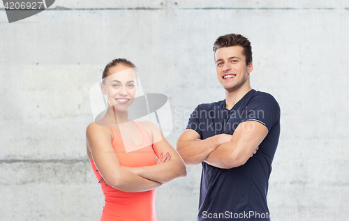 Image of happy sportive man and woman