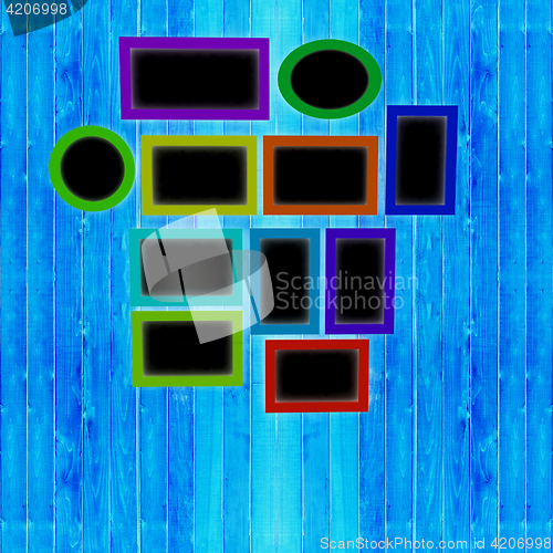 Image of Mock up picture frames on wood wall. 3d illustration