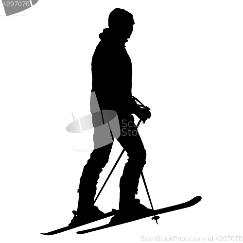 Image of Skier standing on the snow. sport silhouette