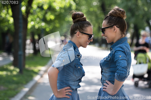 Image of twin sister with sunglasses