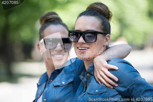 Image of twin sister with sunglasses