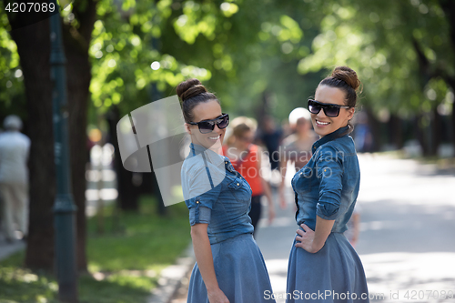 Image of twin sister with sunglasses