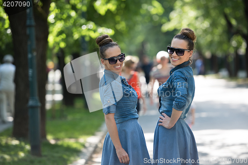 Image of twin sister with sunglasses