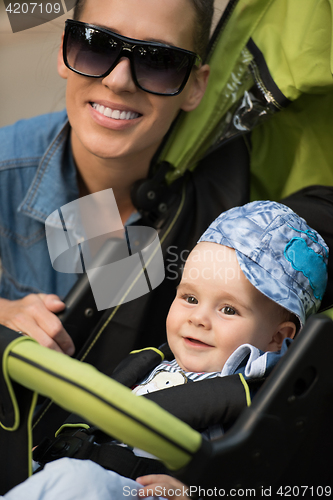 Image of mother and baby in the park