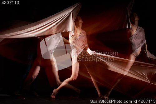 Image of The sensual and emotional dance of beautiful ballerina