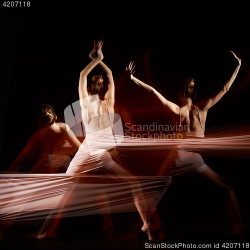 Image of The sensual and emotional dance of beautiful ballerina