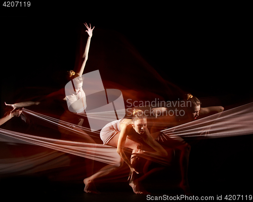 Image of The sensual and emotional dance of beautiful ballerina