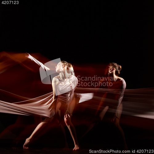 Image of The sensual and emotional dance of beautiful ballerina