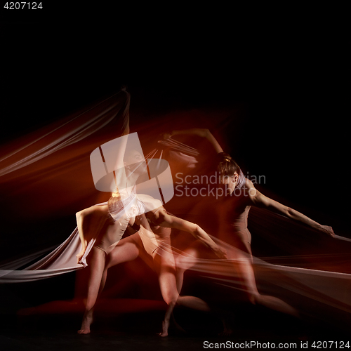 Image of The sensual and emotional dance of beautiful ballerina