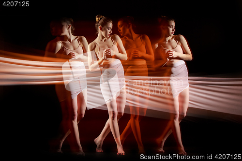 Image of The sensual and emotional dance of beautiful ballerina