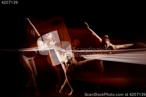 Image of The sensual and emotional dance of beautiful ballerina