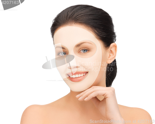 Image of beautiful young woman with collagen facial mask