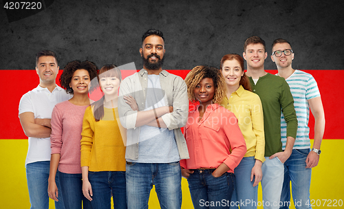 Image of international group of people over german flag