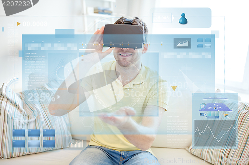 Image of young man in virtual reality headset or 3d glasses