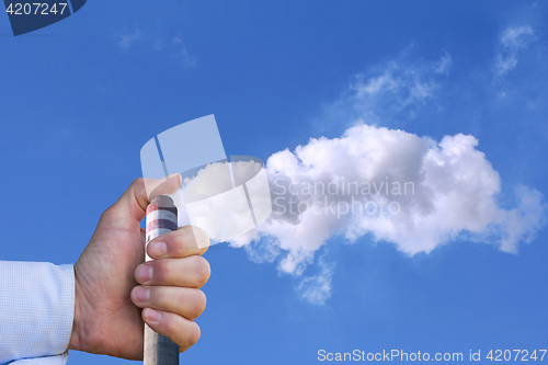 Image of Man with hand making stop to environmental pollution