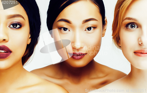 Image of three different nation woman: asian, african-american, caucasian together isolated on white background happy smiling, diverse type on skin, lifestyle people concept 