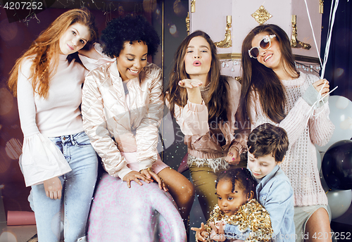 Image of Lifestyle and people concept: young pretty diversity nations woman with different age children celebrating on birth day party together happy smiling, making selfie. African-american, asian and caucasi