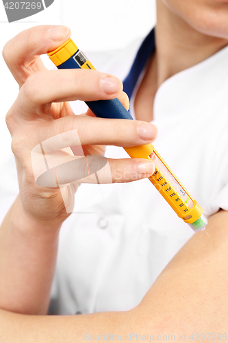 Image of Diabetes, a woman with diabetes A woman injected insulin in the arm