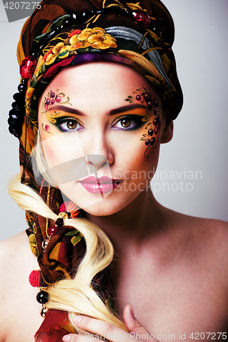 Image of portrait of contemporary noblewoman with face art creative close