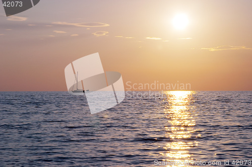 Image of Spectacular sea sunset from the beach of the naturist camping of Cervar Porec (Parenzo), Istria, Croatia