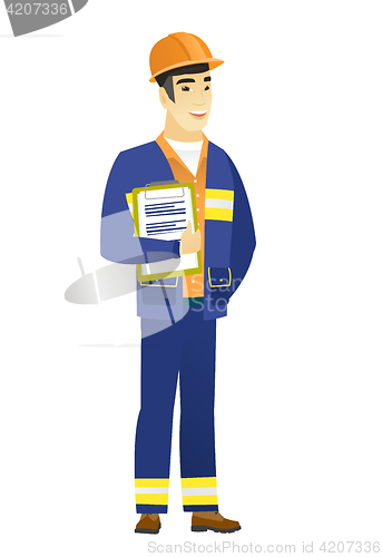Image of Builder holding clipboard with papers.