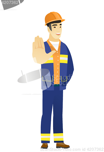 Image of Asian builder showing palm hand.