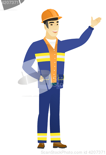 Image of Asian builder showing a direction.